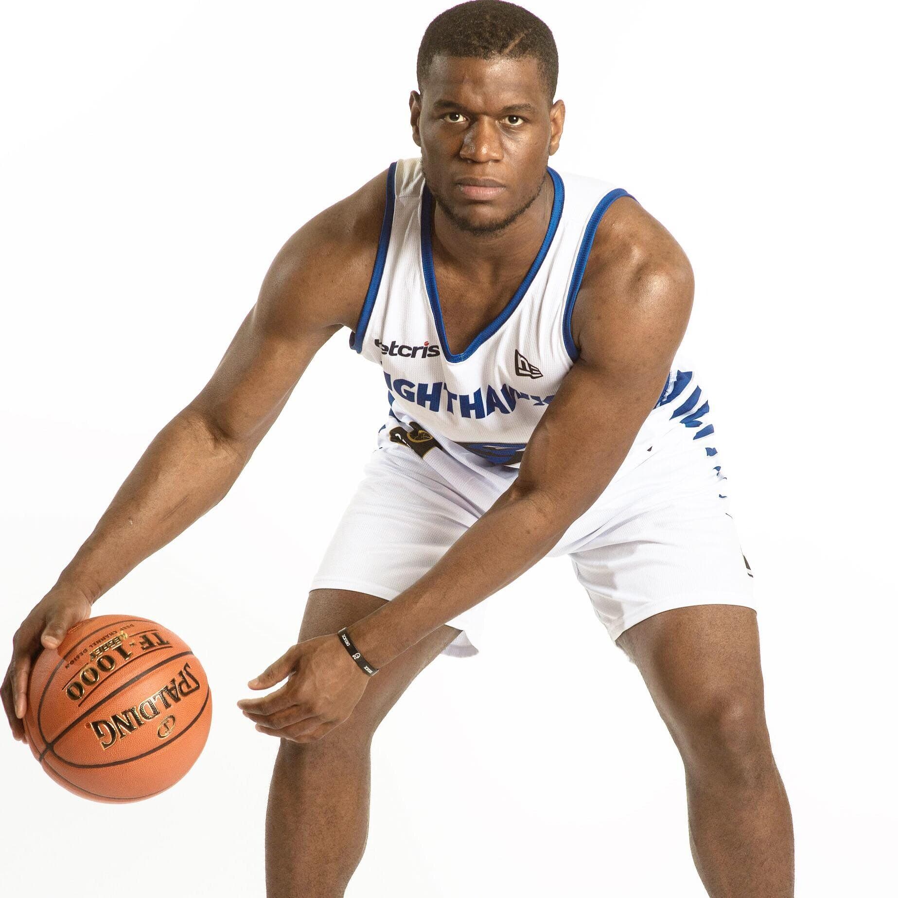 Basketball athletes in custom team kits
